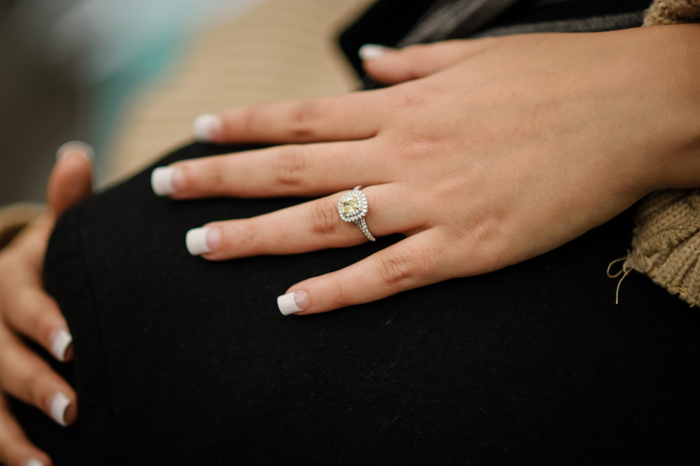 engagement-ring-on-finger-hugging