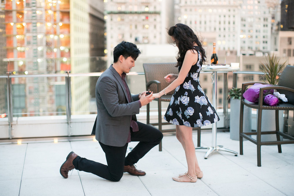 Daniel proposes to Henna at New York rooftop Photo Credit: Petronella Photography, http://bypetronella.com